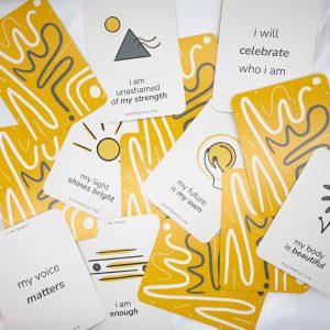 pile of cards with various affirmations