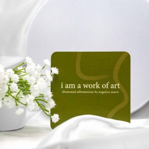 Flowers and card that reads I am a work of art